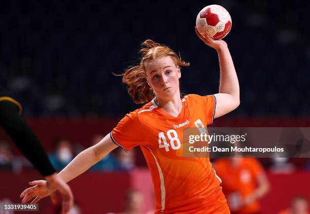 Dione Housheer of Team Netherlands passes the ball during the Women's Preliminary Round Group A handball match between Netherlands and Montenegro on...