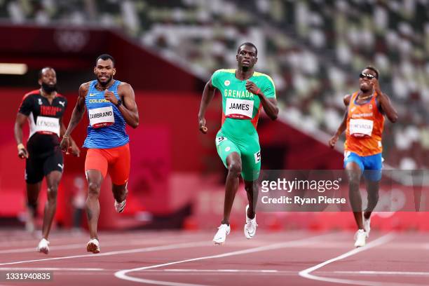 Kirani James of Team Grenada races to the finish line ahead of Anthony Jose Zambrano of Team Colombia, Liemarvin Bonevacia of Team Netherlands and...