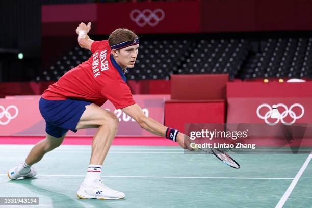 Viktor Axelsen of Team Denmark competes against Chen Long of Team China during the Men’s Singles Gold Medal match on day ten of the Tokyo 2020...