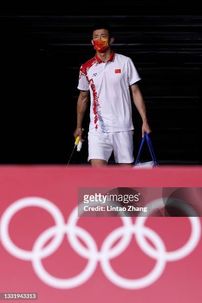 Chen Long of Team China steps into the court prior to the competition against Viktor Axelsen of Team Denmark during the Men’s Singles Gold Medal...