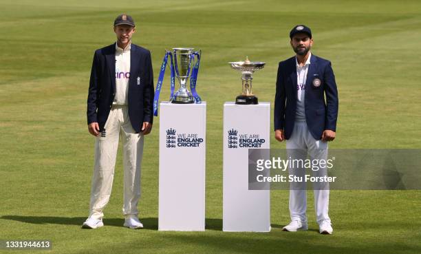 England captain Joe Root and India captain Virat Kohli with the series trophies ahead of the First Test Match between England and India at Trent...