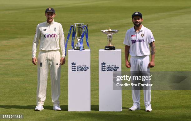 England captain Joe Root and India captain Virat Kohli with the series trophies ahead of the First Test Match between England and India at Trent...