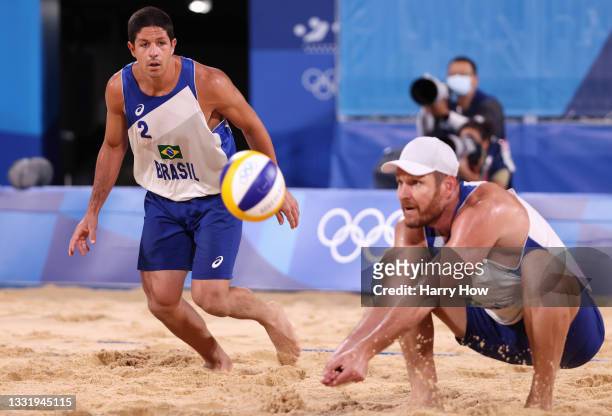 Alison Cerutti and Alvaro Morais Filho of Team Brazil compete against Team Mexico during the Men's Round of 16 beach volleyball on day ten of the...