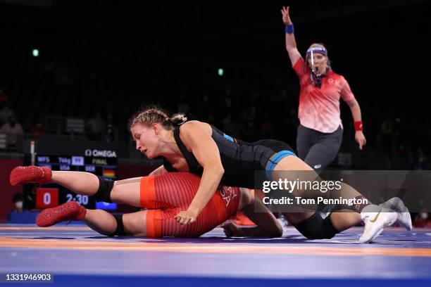 Adeline Maria Gray of Team United States competes against Aline Rotter Focken of Team Germany during the Women's Freestyle 76kg Final on day ten of...