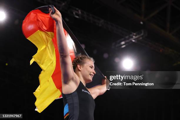 Aline Rotter Focken of Team Germany celebrates after defeating Adeline Maria Gray of Team United States during the Women's Freestyle 76kg Final on...