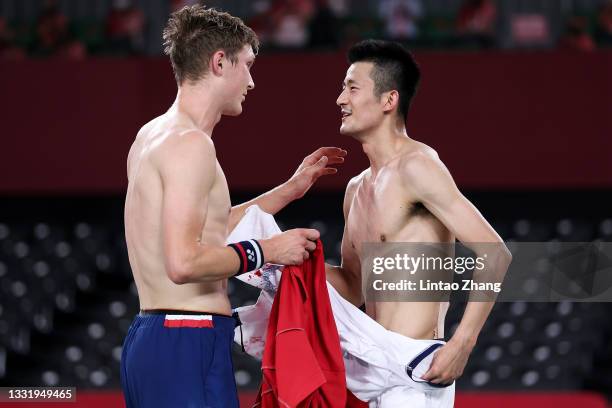 Viktor Axelsen of Team Denmark celebrates as he wins against Chen Long of Team China during the Men’s Singles Gold Medal match on day ten of the...