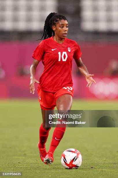 Ashley Lawrence of Team Canada runs with the ball during the Women's Semi-Final match between USA and Canada on day ten of the Tokyo Olympic Games at...