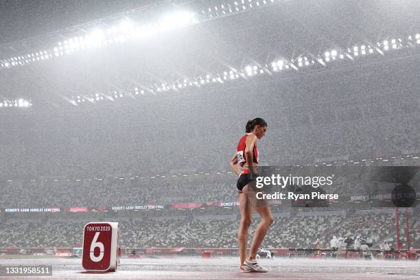 Lea Sprunger of Team Switzerland prepares to compete in the rain during the women's 400 metres semifinal on day ten of the Tokyo 2020 Olympic Games...