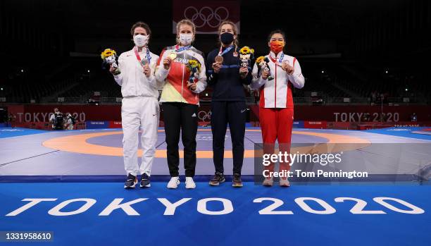 Women's Freestyle 76kg medalists Adeline Maria Gray of Team United States , Aline Rotter Focken of Team Germany , Yasemin Adar of Team Turkey and...