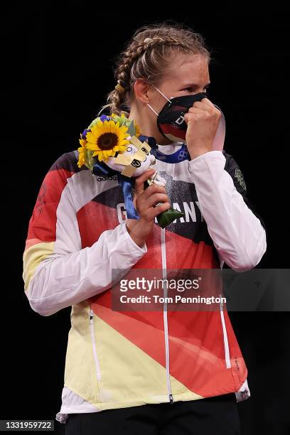 Women's Freestyle 76kg gold medalist Aline Rotter Focken of Team Germany poses with her medal during the Victory Ceremony on day ten of the Tokyo...