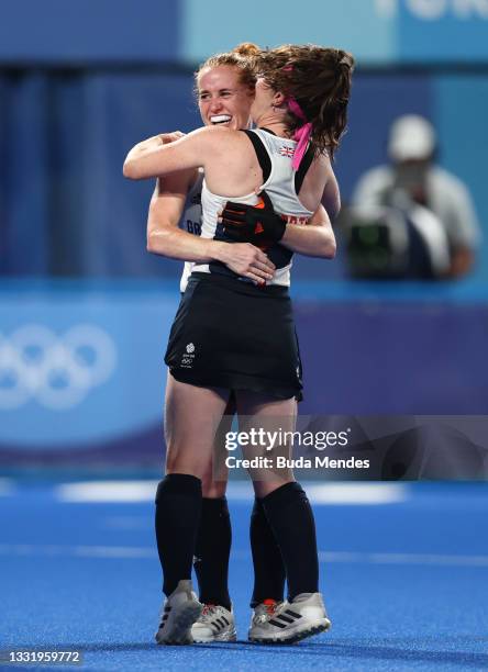 Sarah Louise Jones and Laura Unsworth of Team Great Britain celebrate victory in the Women's Quarterfinal match between Spain and Great Britain on...