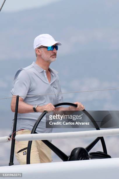 King Felipe VI of Spain competes onboard the boat Aifos, during the 39th Copa Del Rey Mapfre Sailing Cup at Real Club Nautico on August 02, 2021 in...