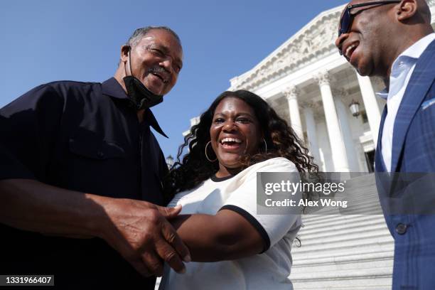 The Rev. Jesse Jackson greets U.S. Cori Bush outside the U.S. Capitol August 2, 2021 in Washington, DC. Rep. Bush has been camping out at the front...