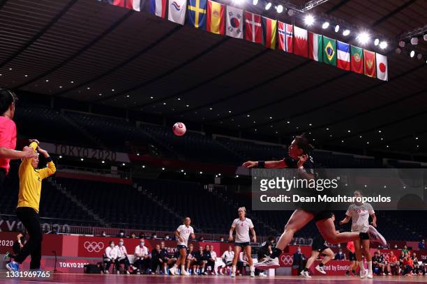 Haruno Sasaki of Team Japan shots for goal at Katrine Lunde of Team Norway during the Women's Preliminary Round Group A handball match between Norway...