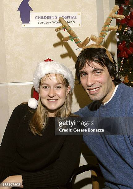 Andrea Meszaros and Carlo Ponti Jr. During Carlo Ponti Jr. Visits Cancer Patients at Loma Linda Hospital for the 2004 Holiday Season at Loma Linda...