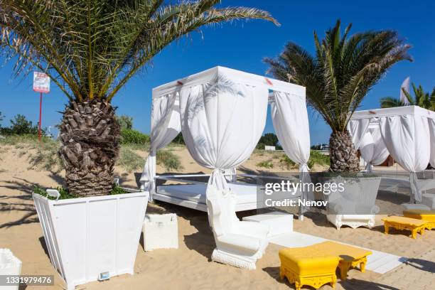 beach tent on the shore - beach pavilion stock pictures, royalty-free photos & images