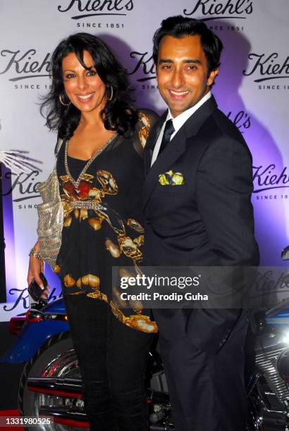 Pooja Bedi and Rahul Khanna attend tha launch of American skincare brand 'Kiehls' on December 14, 2011 in Mumbai,India