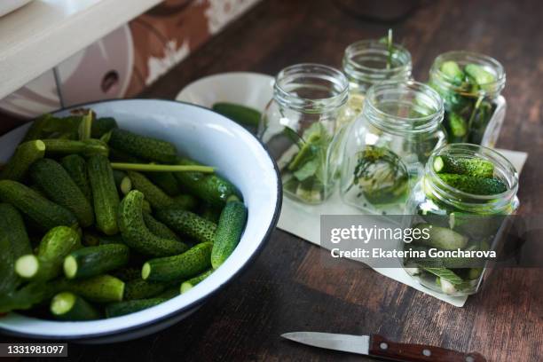 pickles from cucumbers. - essiggurke stock-fotos und bilder