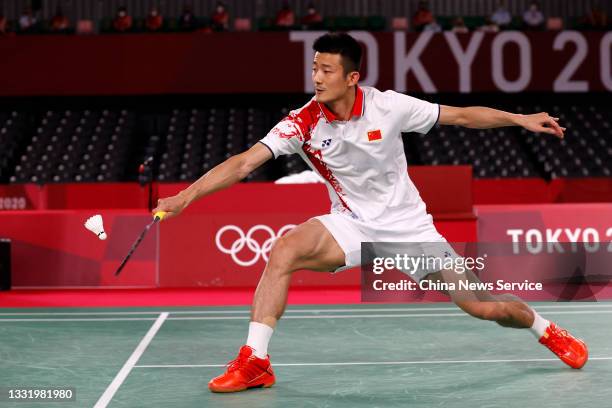 Chen Long of China competes against Viktor Axelsen of Denmark in the Badminton Men's Singles Gold Medal Match on day ten of the Tokyo 2020 Olympic...