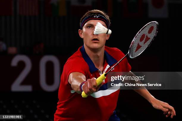 Viktor Axelsen of Denmark competes against Chen Long of China in the Badminton Men's Singles Gold Medal Match on day ten of the Tokyo 2020 Olympic...