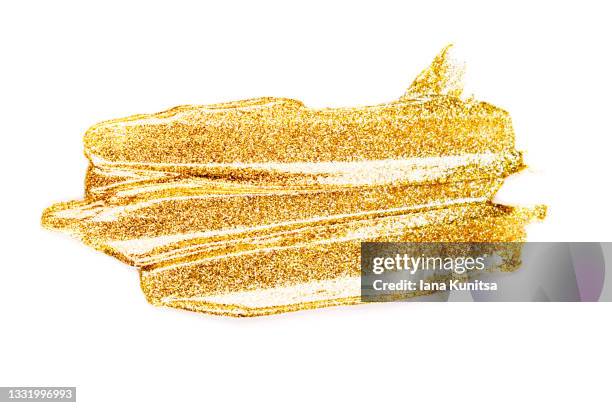 golden stroke of paint, nail polish, gold face mask on white background isolated. cosmetic products. makeup. - gold nail polish imagens e fotografias de stock