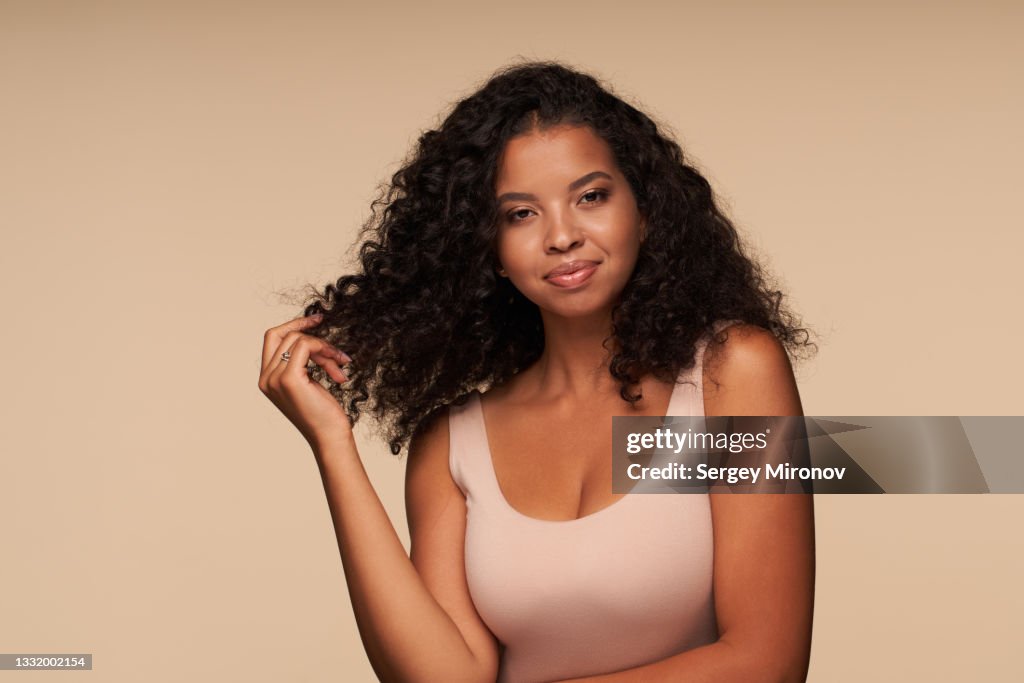 Pretty Mix'd Races Portrait Of Beautiful Mixed Race Woman On Beige Background Stock-Foto ...