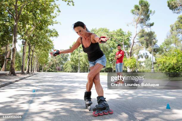 inline skating classes on the street - pensioners demonstrate in spain stock pictures, royalty-free photos & images