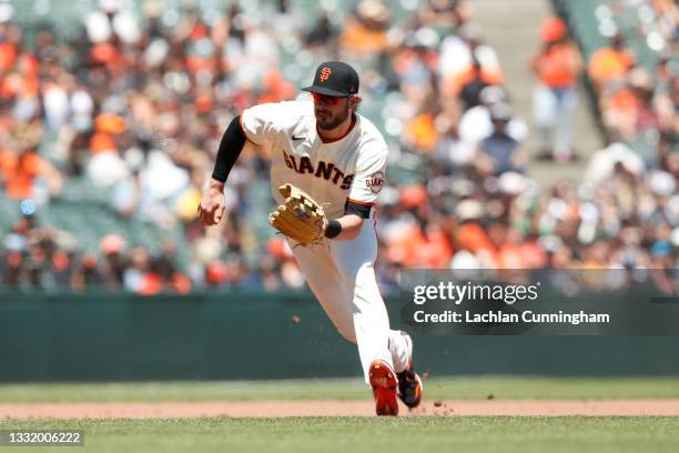Third baseman Kris Bryant of the San Francisco Giants fields the ball against the Houston Astros at Oracle Park on August 01, 2021 in San Francisco,...