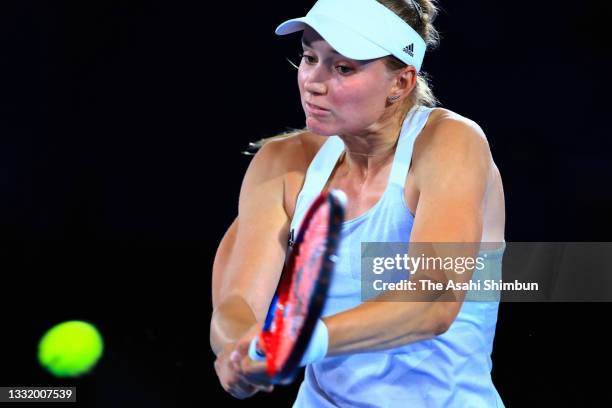 Elena Rybakina of Kazakhstan plays a backhand in the Women's Singles bronze medal match against Elina Svitolina of Team Ukraine on day eight of the...