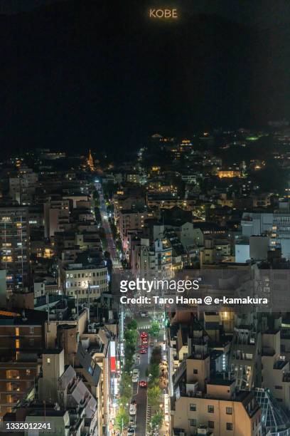 illuminated street in kobe city of japan - kobe japan stock pictures, royalty-free photos & images