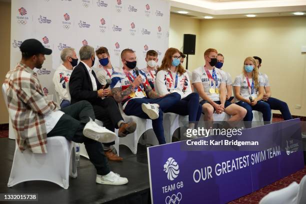 Team GB swimmers take part in a Q&A during the National Lottery's event celebrating "our greatest swim team" at Sheraton Heathrow Hotel on August 02,...