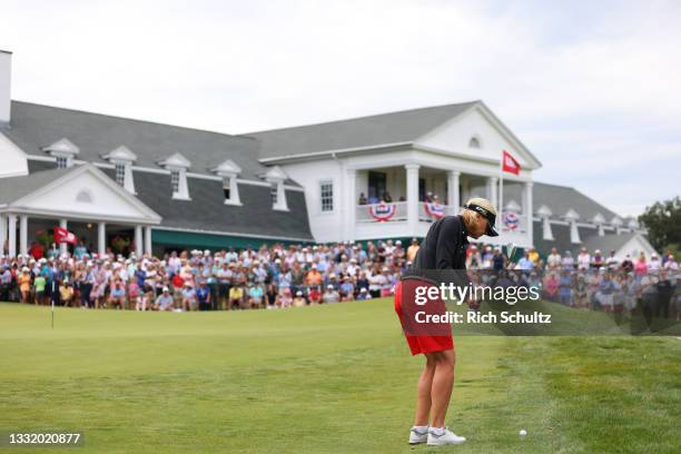 Liselotte Neumann of Sweden hits chips onto the 17th green during the final round of the 2021 U.S. Senior Women's Open at Brooklawn Country Club on...