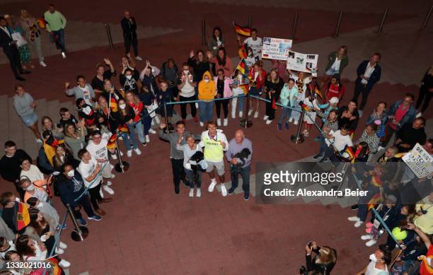 German tennis player and Tokyo 2020 gold medalist Alexander Zverev and his family wavel surrounded by fans after his arrival at Airport Munich on...