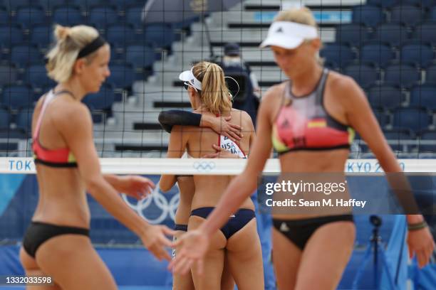 Alix Klineman of Team United States celebrates with April Ross against Team Germany during the Women's Quarterfinal beach volleyball on day eleven of...