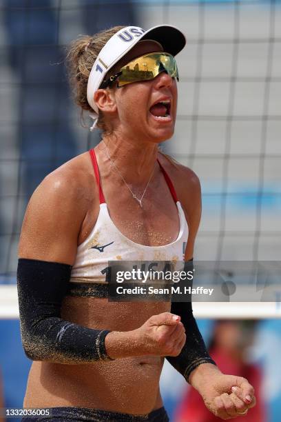 April Ross of Team United States celebrates after the play against Team Germany during the Women's Quarterfinal beach volleyball on day eleven of the...