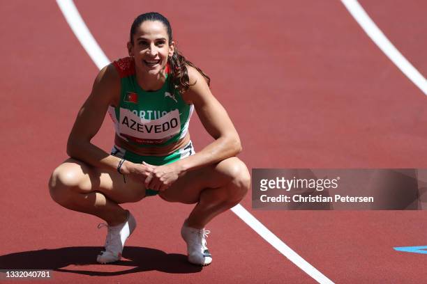 Catia Azevedo of Team Portugal reacts after competing in round one of the Women's 400m heats on day eleven of the Tokyo 2020 Olympic Games at Olympic...
