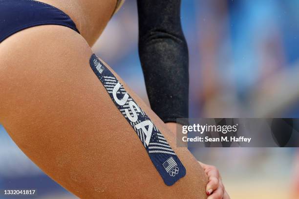 Detail view of Team United States branded KT Tape worn by April Ross of Team United States against Team Germany during the Women's Quarterfinal beach...