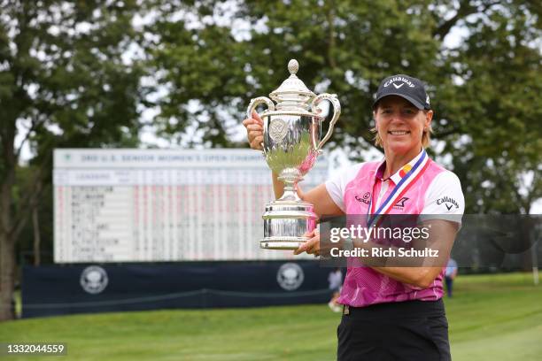 Annika Sorenstam of Sweden holds up the cup after winning the 2021 U.S. Senior Women's Open Championship on August 1, 2021 in Fairfield, Connecticut.