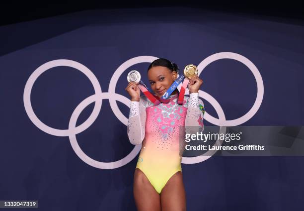 Rebeca Andrade of Team Brazil poses with her women's all-around silver and vault gold medals during on day ten of the Tokyo 2020 Olympic Games at...
