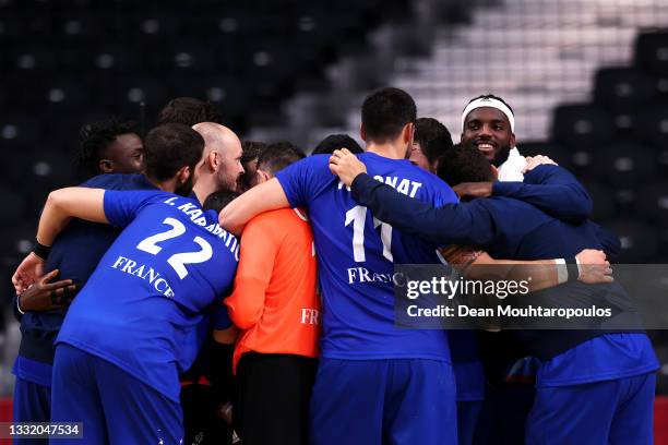 Dika Mem of Team France celebrates with teammates after winning the Men's Quarterfinal handball match between France and Bahrain on day eleven of the...