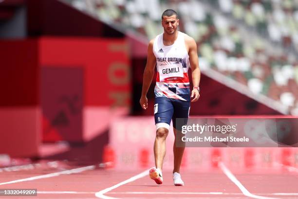 Adam Gemili of Team Great Britain walks during round one of the Men's 200m heats after an apparent injury on day eleven of the Tokyo 2020 Olympic...