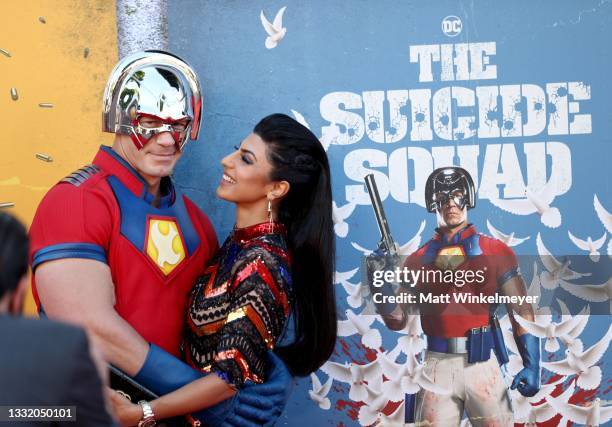 John Cena and Shay Shariatzadeh attend the Warner Bros. Premiere of "The Suicide Squad" at Regency Village Theatre on August 02, 2021 in Los Angeles,...