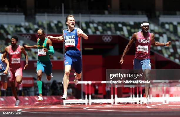 Karsten Warholm of Team Norway reacts after finishing first ahead of Rai Benjamin of Team United States in the Men's 400m Hurdles Final on day eleven...