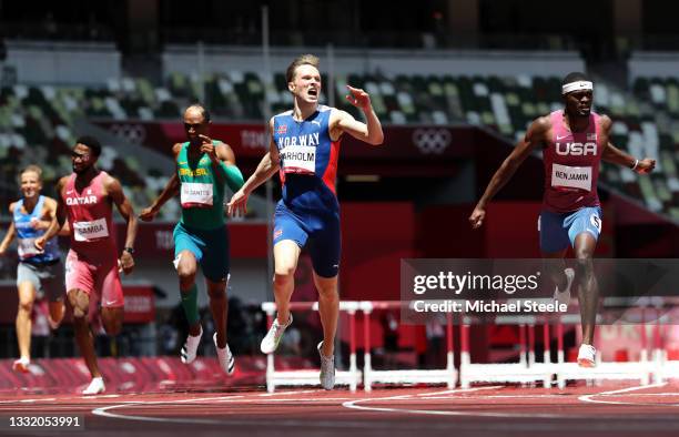 Karsten Warholm of Team Norway reacts after finishing first ahead of Rai Benjamin of Team United States in the Men's 400m Hurdles Final on day eleven...