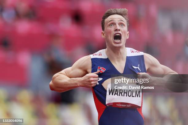 Karsten Warholm of Team Norway reacts after finishing first in the Men's 400m Hurdles Final on day eleven of the Tokyo 2020 Olympic Games at Olympic...
