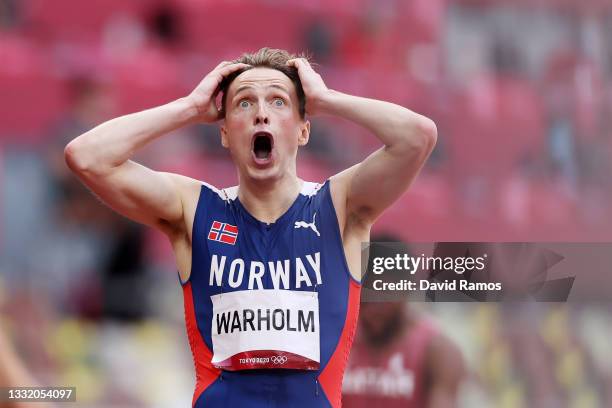 Karsten Warholm of Team Norway reacts after finishing first in the Men's 400m Hurdles Final on day eleven of the Tokyo 2020 Olympic Games at Olympic...