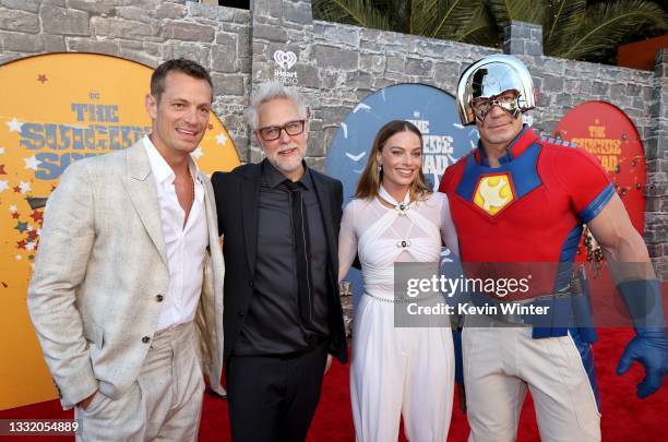 Joel Kinnaman, James Gunn, Margot Robbie, and John Cena attend the Warner Bros. Premiere of "The Suicide Squad" at Regency Village Theatre on August...