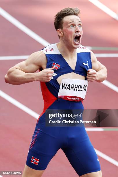 Karsten Warholm of Team Norway reacts after winning the gold medal in the Men's 400m Hurdles Final on day eleven of the Tokyo 2020 Olympic Games at...