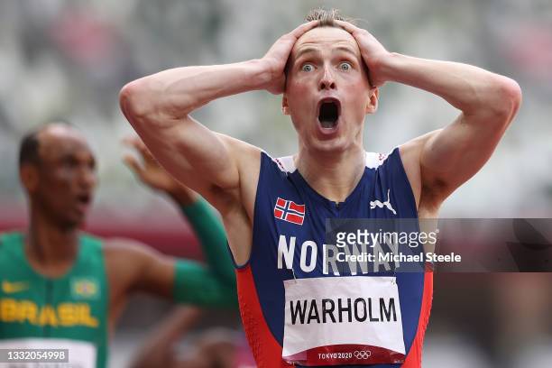 Karsten Warholm of Team Norway reacts after winning the gold medal in the Men's 400m Hurdles Final on day eleven of the Tokyo 2020 Olympic Games at...