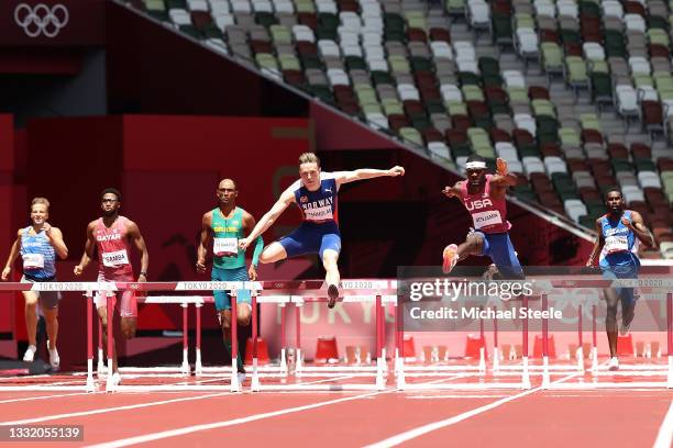 Karsten Warholm of Team Norway and Rai Benjamin of Team United States compete in the Men's 400m Hurdles Final on day eleven of the Tokyo 2020 Olympic...